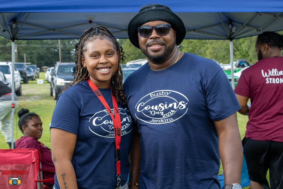 A couple in matching Cousins Day shirts at the annual family reunion in Furman, SC